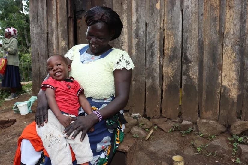 Muriithi and his grandmother Jeniffer